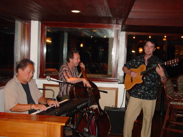 Eddie and Gene Argel, Bob Harrison at Kapalua Hotel, Maui.